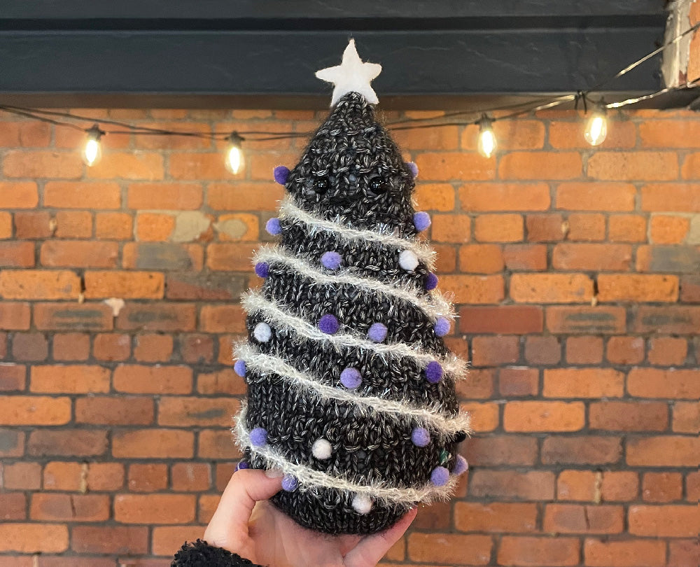 Black christmas tree discount